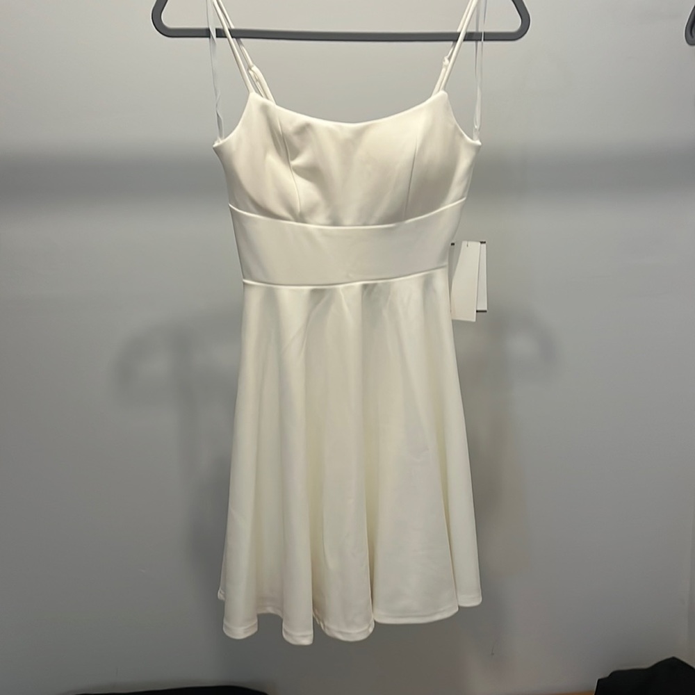City Vibe Lace Back Scoop Neck Fit-And-Flare Dress